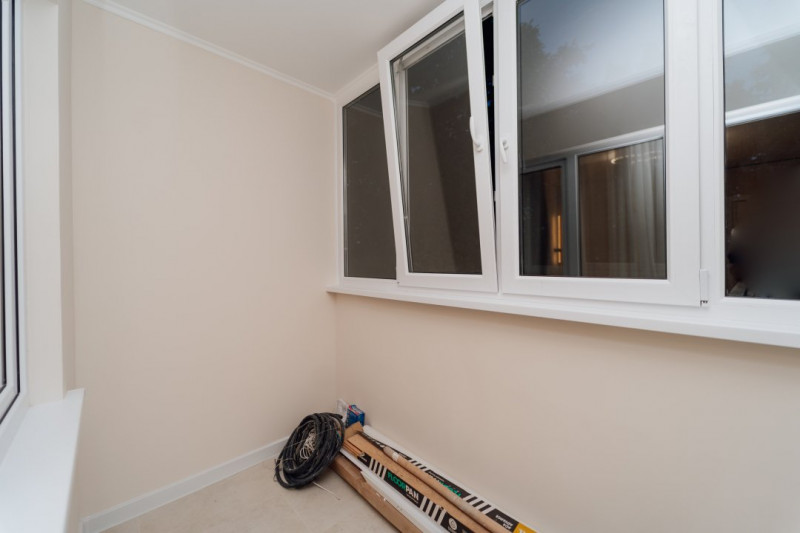 Botanica, bd. Dacia 28, apartament 2 camere + living, seria Varnița.